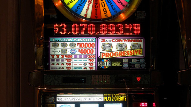 Up Close View of Wheel of Fortune Slot Machine Placard