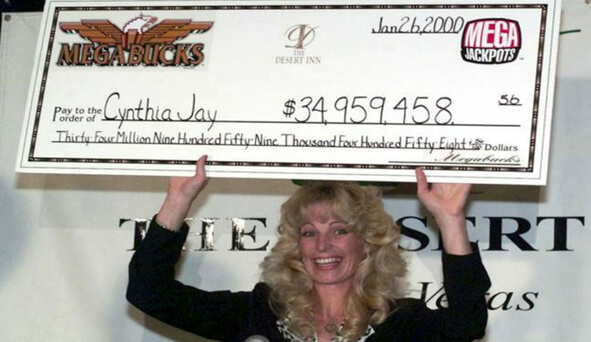 Cynthia Jay-Brennan Holding the Check From the Megabucks Jackpot