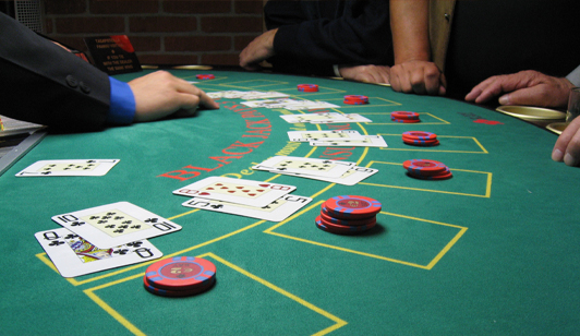 People Playing at Blackjack Table