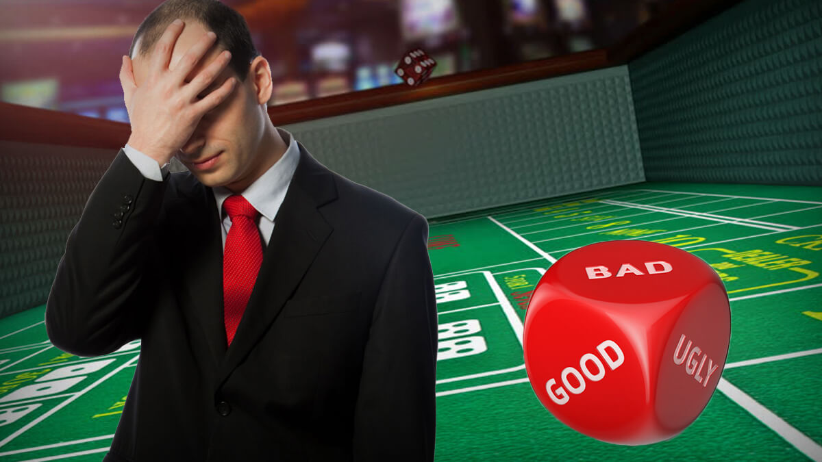 Casino Craps Table, Red Dice, Man With Hand Over Face Disappointed