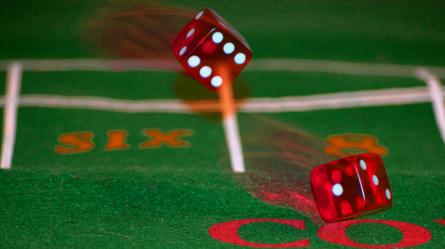 Craps Dice Rolling Down a Craps Table