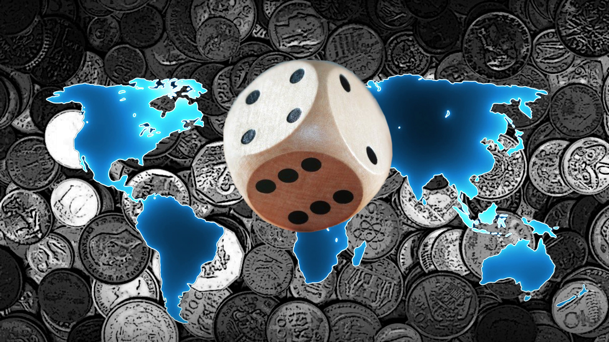 A Die in Front of a World Map Outline in Front of a Mix of World Coins