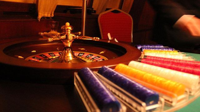 Closeup of Roulette Wheel and Reserve Chip Stacks