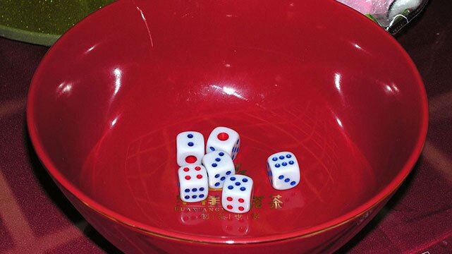 Mooncake Dice Game on a Table