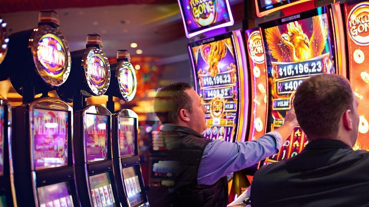 Row of Slots on Left Two Men Playing Slots on Right